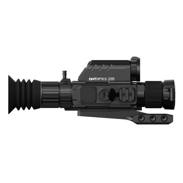 Black tactical rifle scope attached to a mounting rail, with textured adjustment knobs and a ridged eyepiece.